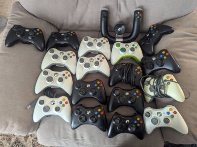 Massive Xbox Lot - 7 Xbox 360s, 3 Xbox Ones, 22 controllers, 7 power packs!