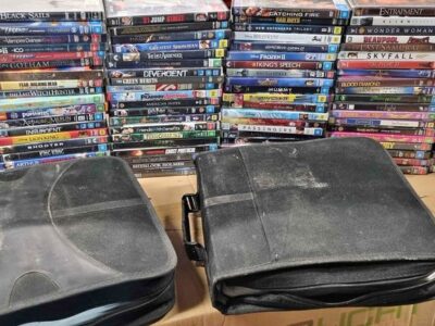 Over 400 Dvds Tv Series Sets And Movies - 100 In Cases Plus 300 More In Pouches