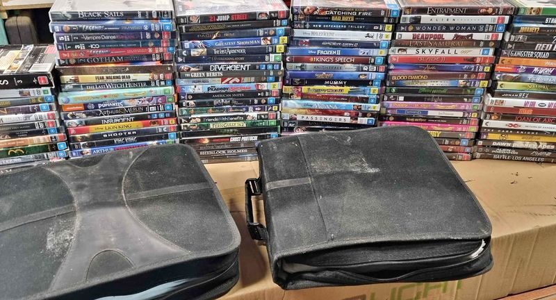 Over 400 Dvds Tv Series Sets And Movies - 100 In Cases Plus 300 More In Pouches