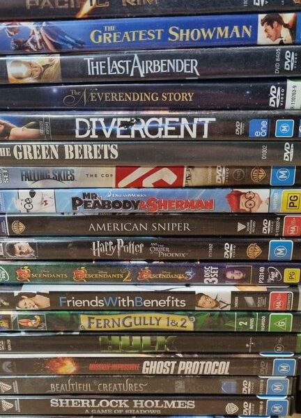 Over 400 Dvds Tv Series Sets And Movies - 100 In Cases Plus 300 More In Pouches