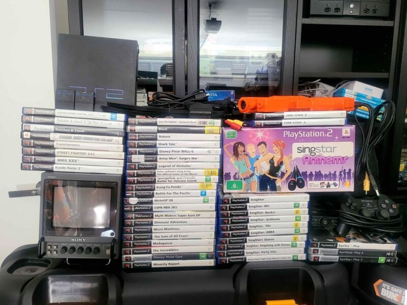 Playstation 2 Model SPCH-30002 With 150 Games And Accessories.