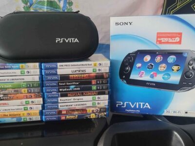 PS Vita Crystal Black Model PCH-1102 Boxed And 20 Games.