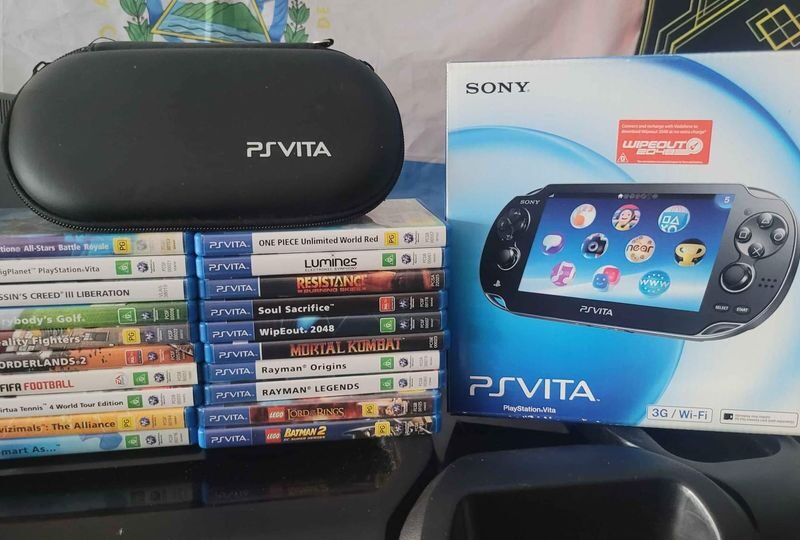 PS Vita Crystal Black Model PCH-1102 Boxed And 20 Games.