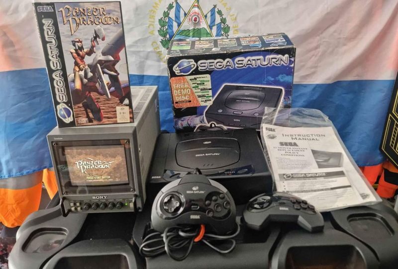 Sega Saturn Boxed Console With Boxed Accessories And 31 Games.