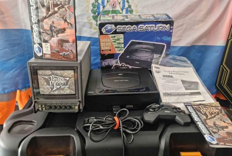 Sega Saturn Boxed Console With Boxed Accessories And 31 Games.